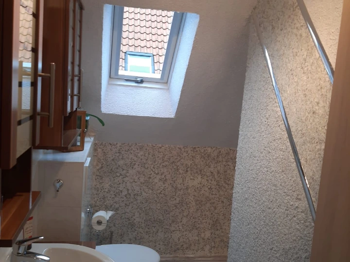 Flüssgtapete auch bekannt als Baumwollputz im Bad eines Kunden